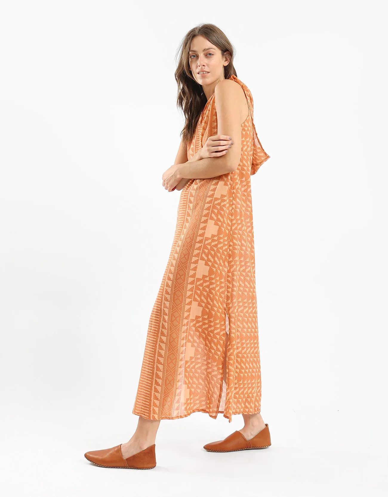 Printed sleeveless long dress with a hoodie